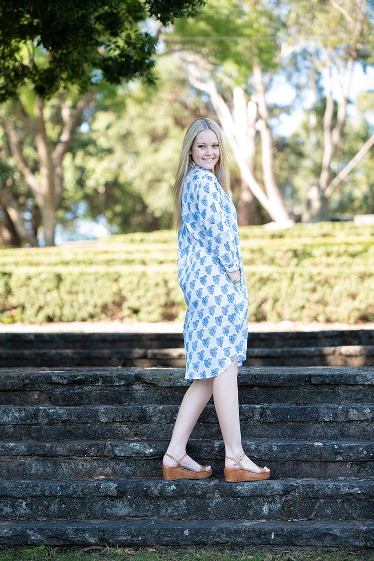 Our Harper Shirt Dress is a soft, 100% cotton, button through dress featuring collar and 3/4 sleeves. Nisa showcases a cute Mehndi style hand block printed pattern crafted by our partner artisans in Jaipur, India.
