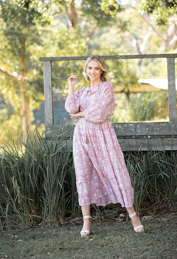 Our Riva Dress is a stunning Bohemian style maxi dress featuring a delicate floral hand block pattern crafted by our partner artisans in Jaipur, India.
