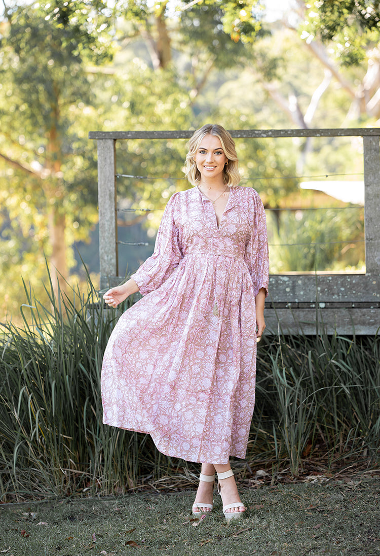 Our Riva Dress is a stunning Bohemian style maxi dress featuring a delicate floral hand block pattern crafted by our partner artisans in Jaipur, India.