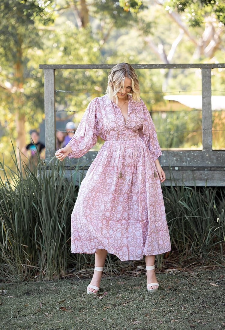 Our Riva Dress is a stunning Bohemian style maxi dress featuring a delicate floral hand block pattern crafted by our partner artisans in Jaipur, India.