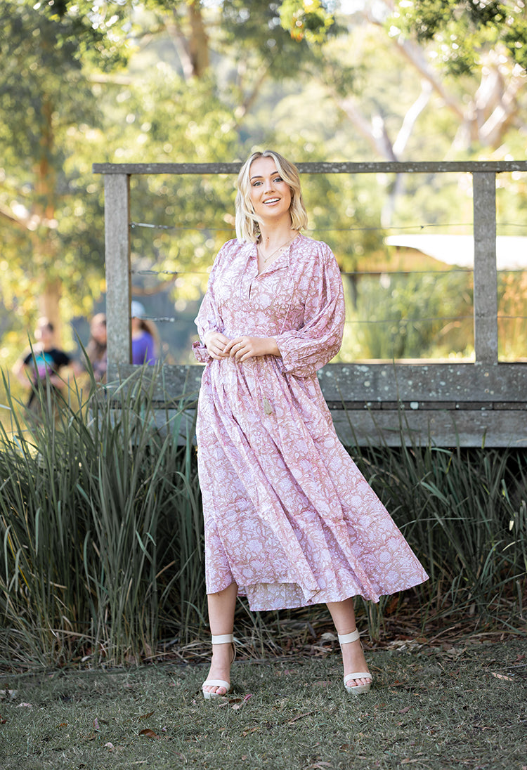 Our Riva Dress is a stunning Bohemian style maxi dress featuring a delicate floral hand block pattern crafted by our partner artisans in Jaipur, India.