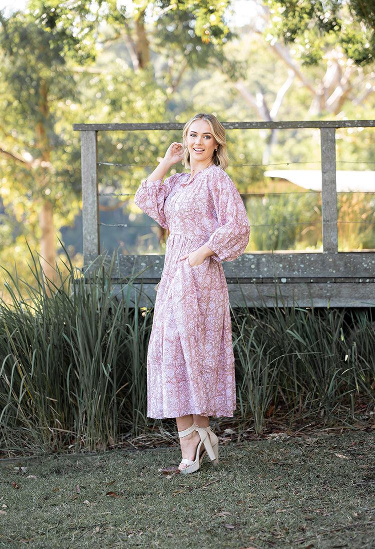 Our Riva Dress is a stunning Bohemian style maxi dress featuring a delicate floral hand block pattern crafted by our partner artisans in Jaipur, India.