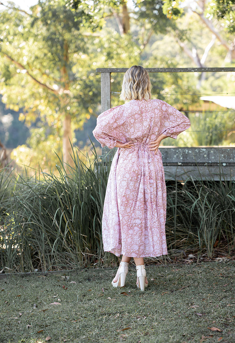 Our Riva Dress is a stunning Bohemian style maxi dress featuring a delicate floral hand block pattern crafted by our partner artisans in Jaipur, India.