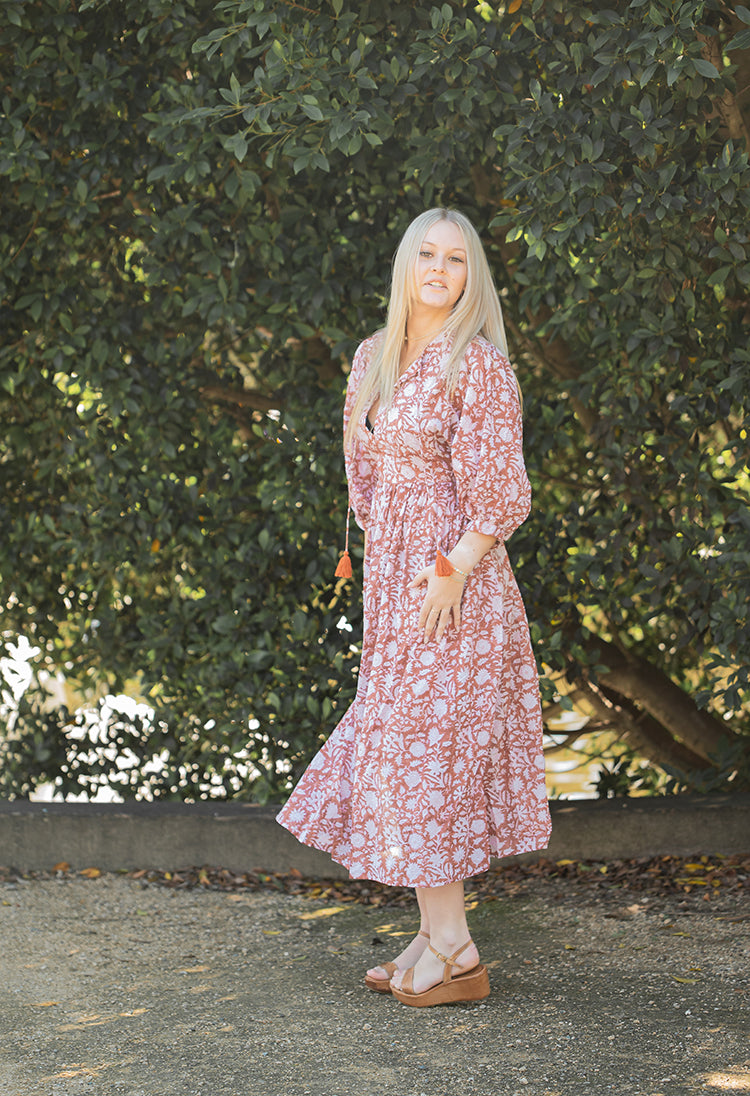 Nora Maxi Dress is a Bohemian style dress with romantic billowy sleeves. Crafted with 100% cotton voile featuring a delicate floral hand block print in a soft rust/beige colourway