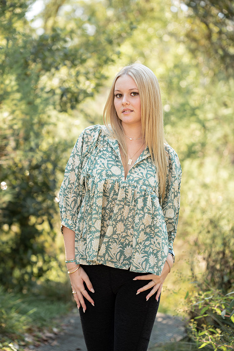 Our Sara Top is a Bohemian style top that is light and flowy. Featuring a floral hand block printed pattern on olive green colourway.