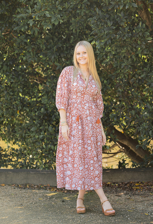Nora Maxi Dress is a Bohemian style dress with romantic billowy sleeves. Crafted with 100% cotton voile featuring a delicate floral hand block print in a soft rust/beige colourway