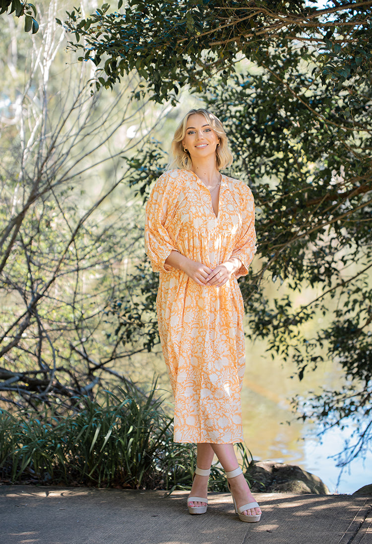 Lisa Maxi Dress - Bohemian style maxi dress featuring delicate floral hand block print in a soft mandarin colourway on 100% cotton voile fabric.