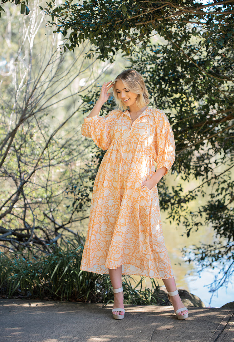 Lisa Maxi Dress - Bohemian style maxi dress featuring delicate floral hand block print in a soft mandarin colourway on 100% cotton voile fabric.