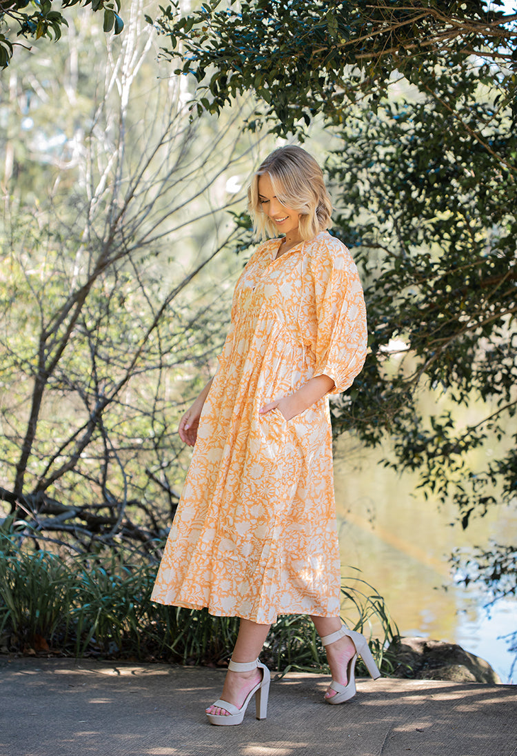 Lisa Maxi Dress - Bohemian style maxi dress featuring delicate floral hand block print in a soft mandarin colourway on 100% cotton voile fabric.