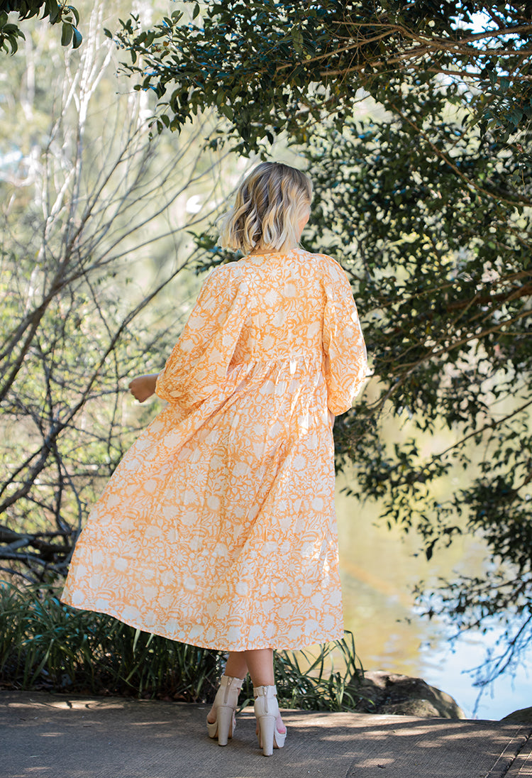 Lisa Maxi Dress - Bohemian style maxi dress featuring delicate floral hand block print in a soft mandarin colourway on 100% cotton voile fabric.