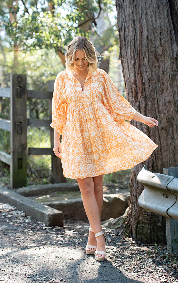 Lisa Midi Dress - Bohemian style midi dress featuring delicate floral hand block print in a soft mandarin colourway on 100% cotton voile fabric.