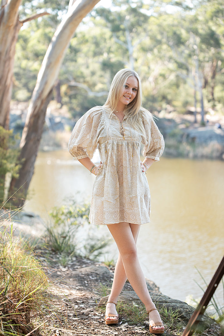 The Daisy Mini Dress is your go to light, flowy, Bohemian style dress. Delicate floral block printed pattern on 100% cotton voile. Mini dress style.